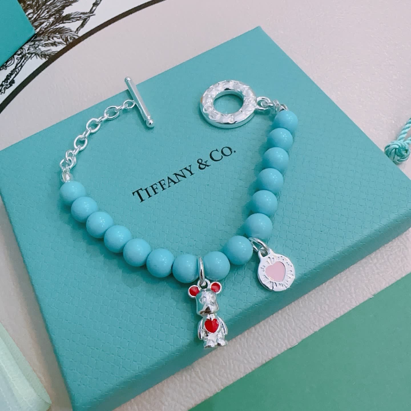 Tiffany & Co. Blue Bead Bracelet with Charms